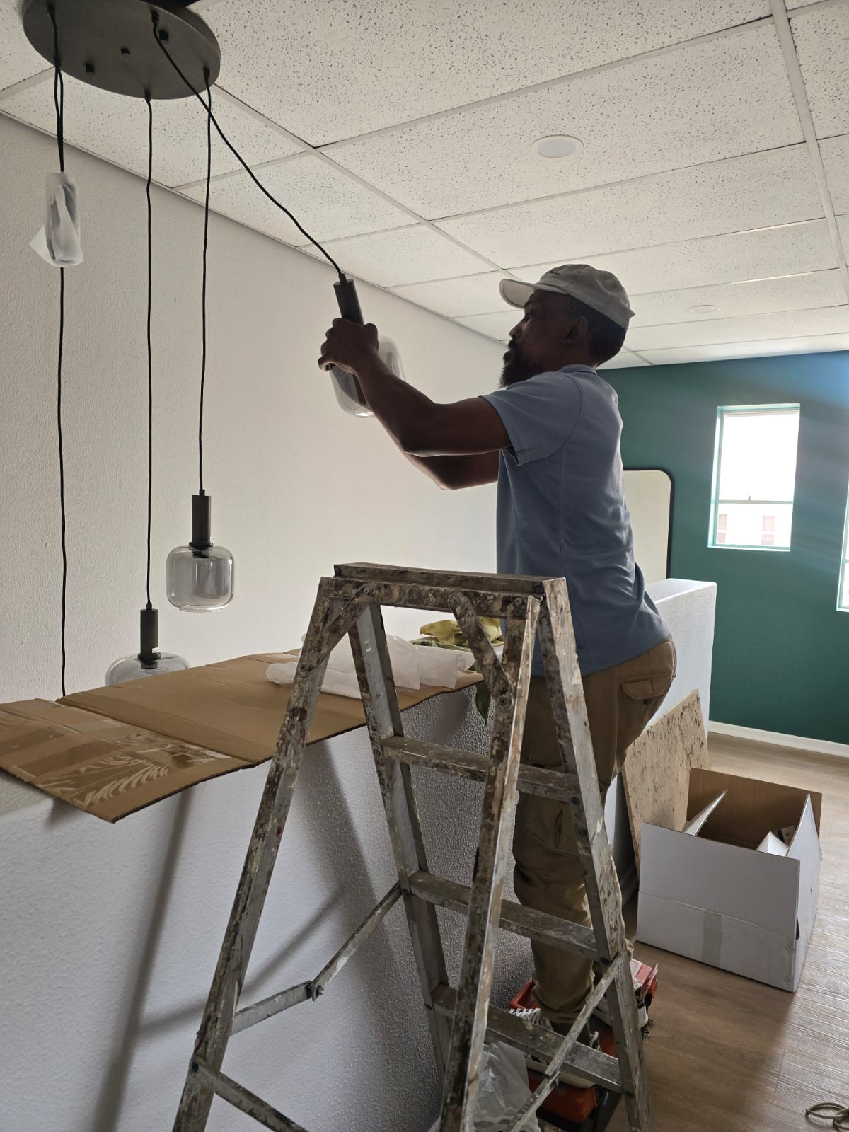 Dimitrov Electrical electrician installing pendant lighting